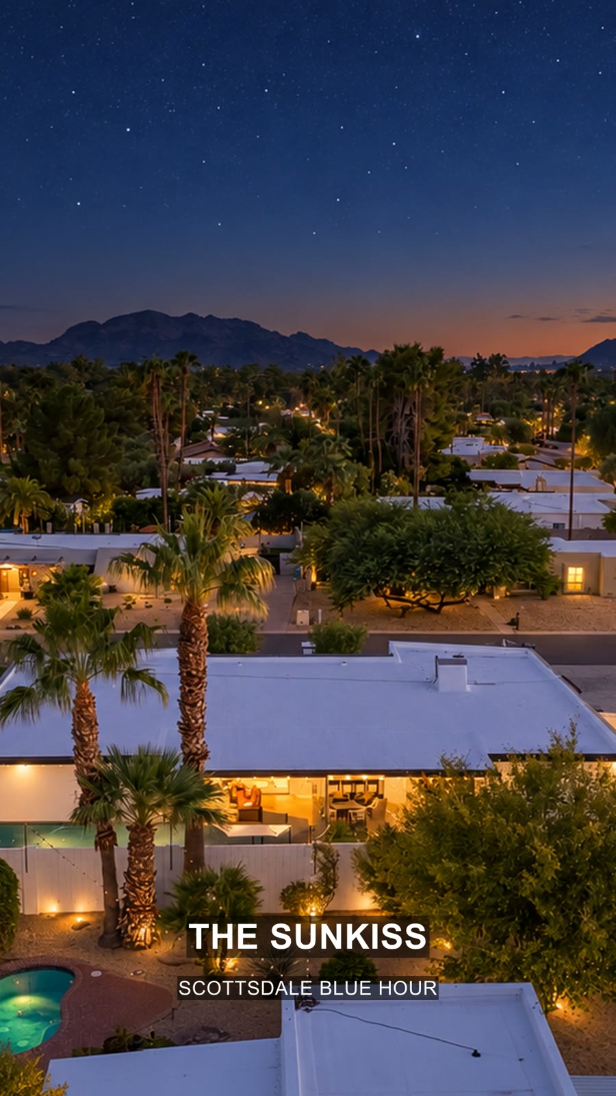 The Sunkiss — A blue-hour portrait of The Sunkiss and its orange-and-yellow sport court.